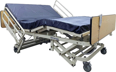 Bariatric long term care bed with a dark blue mattress frame and beige or oak finish bed end boards, equipped with side rails and a remote control.