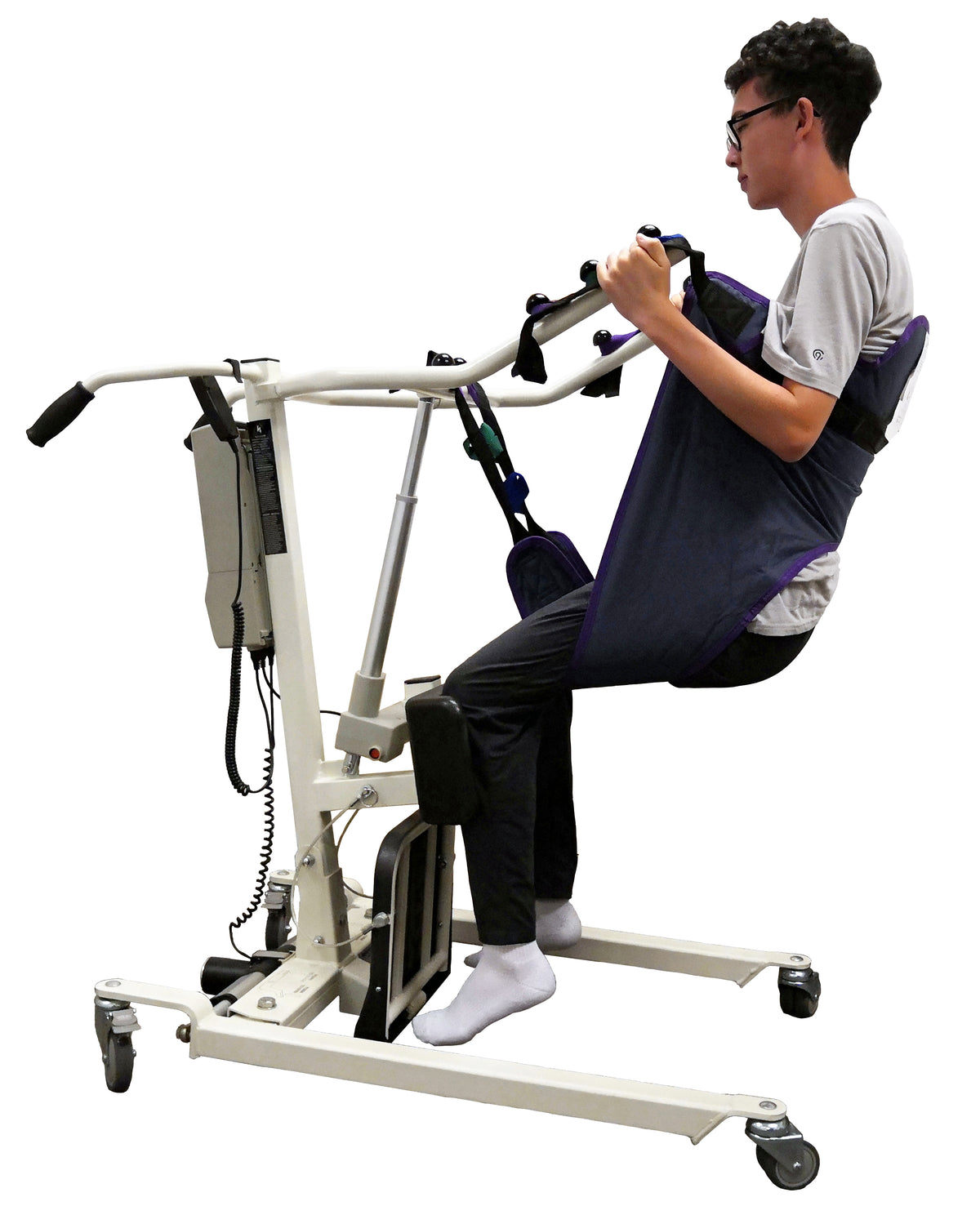 Tuffcare patient lift sling on standing patient lift, lifting patient.