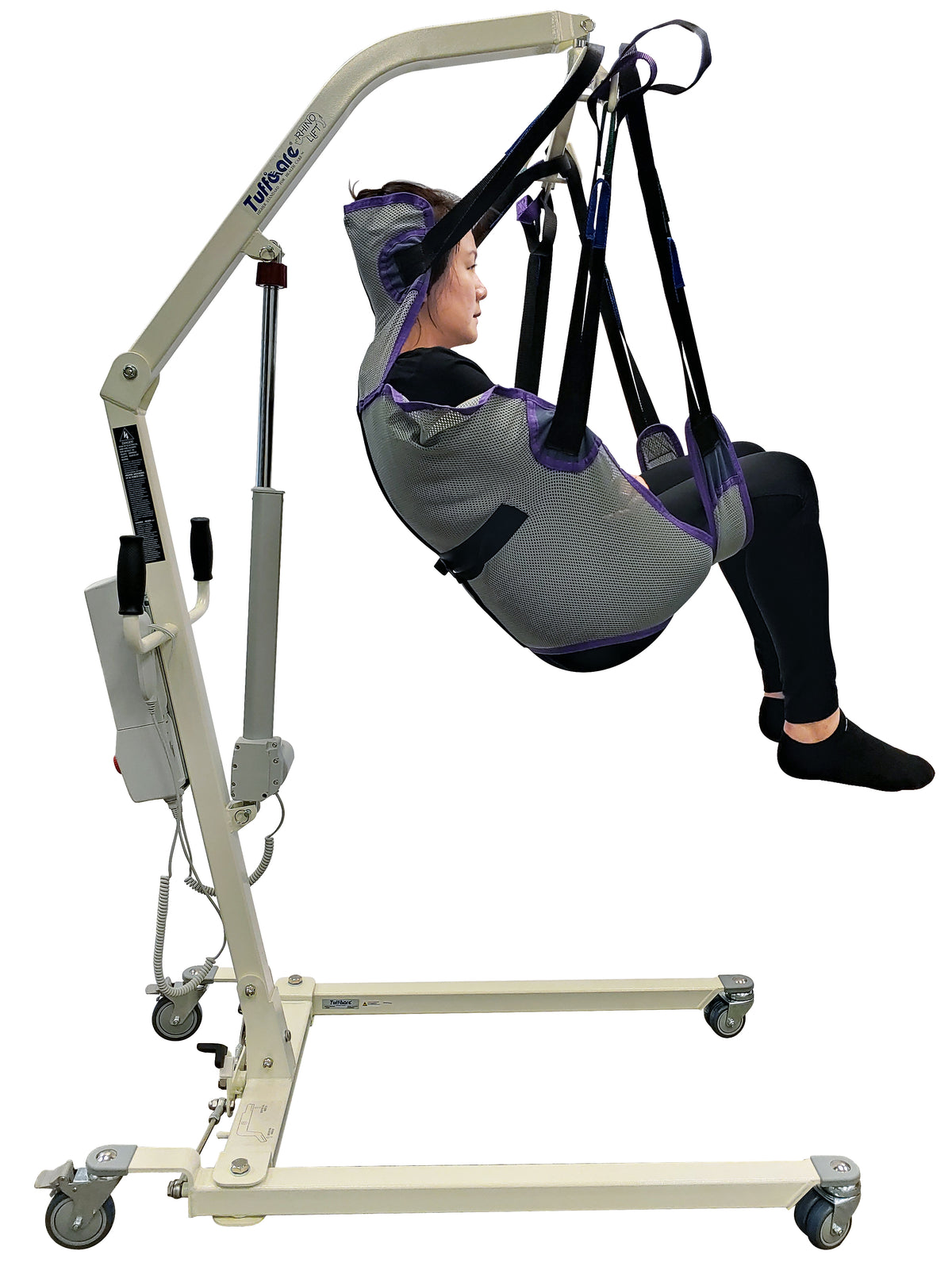 Tuffcare universal quick-dry mesh patient lift sling with integrated headrest, lifting patient.