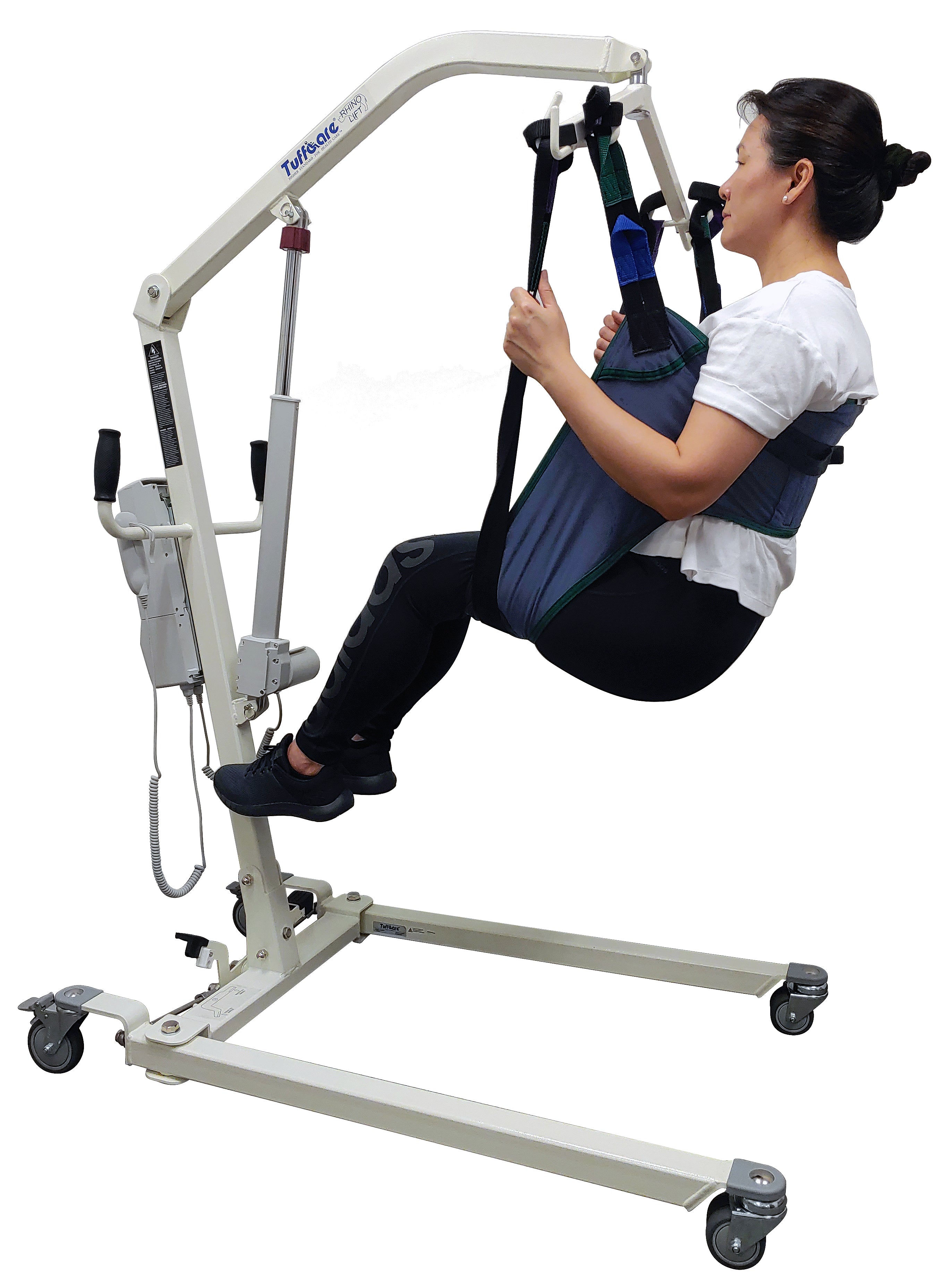 Tuffcare universal padded toileting patient lift sling in use by patient on lift.